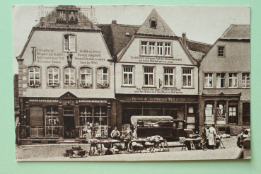 Ansichtskarte AK St Wendel 1925-1945 Domplatz Bekenntnis Sprüche Geschäfte Marktstände Architektur Ortsansicht Saarland